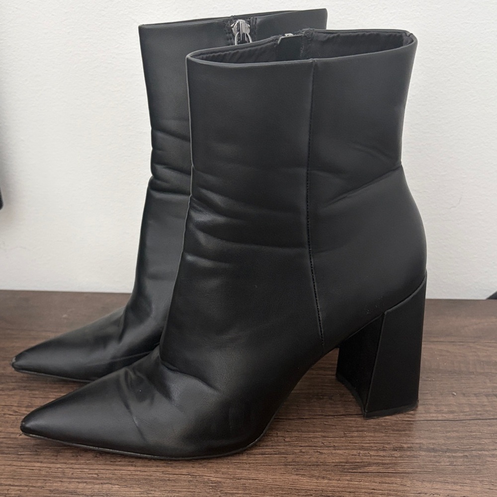 Sleek Black Heeled Boots